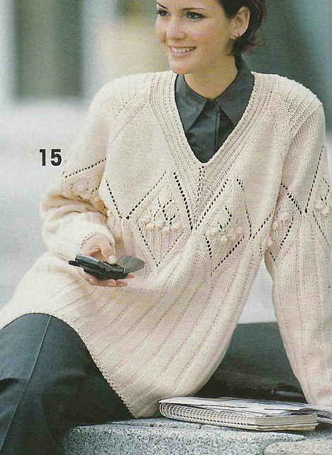 # 15 Pull abricot en raglan