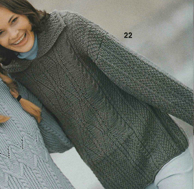 # 22 Pull à motifs en brun clair