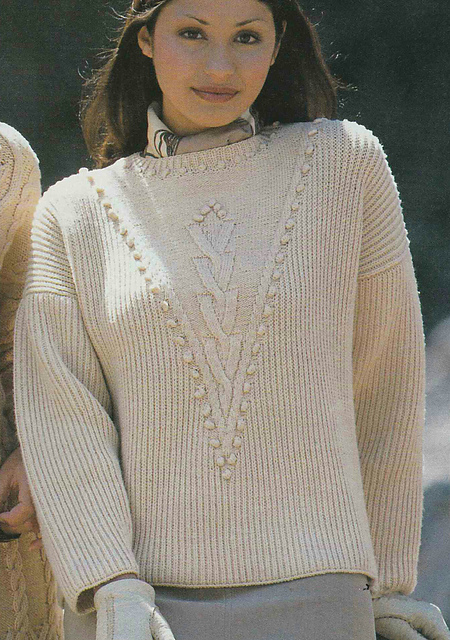 # 09 Pull en coloris poudre