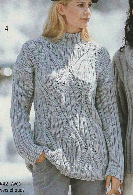 # 04 Pull gris chiné à motif structuré