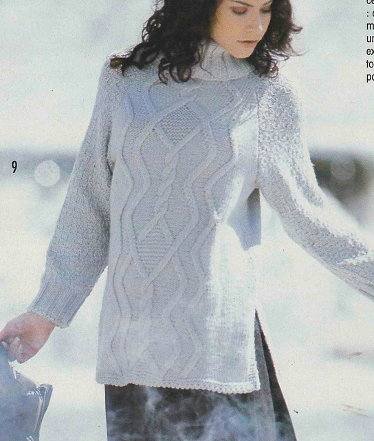 # 09 Pull gris à motifs