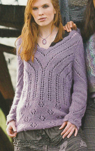 # 01 Pull en mohair à motifs ajourés