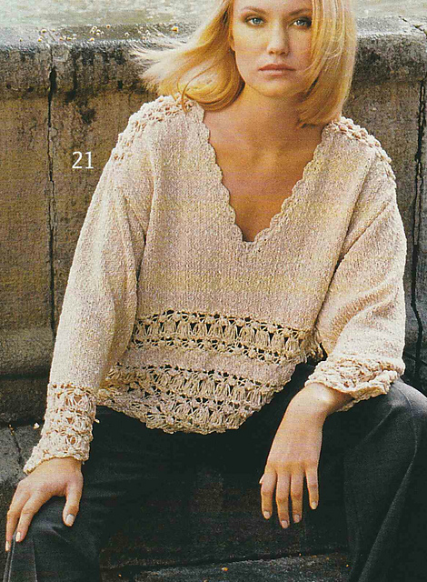 # 21 Pull à rayures ajourées