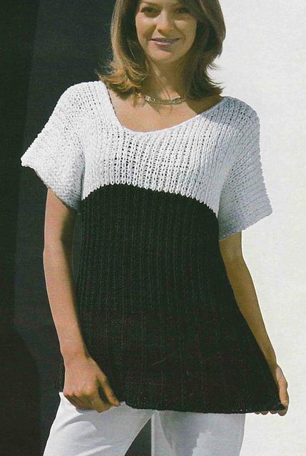 # 22 Pull noir et blanc
