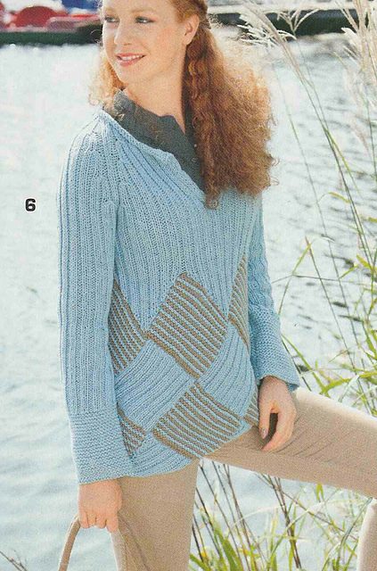 # 06 Pull bleu à l'aspect tressé