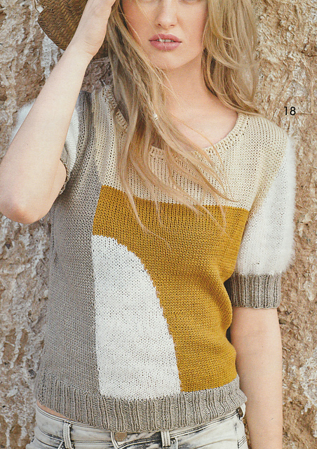# 18 Pull court avec surfaces de couleurs