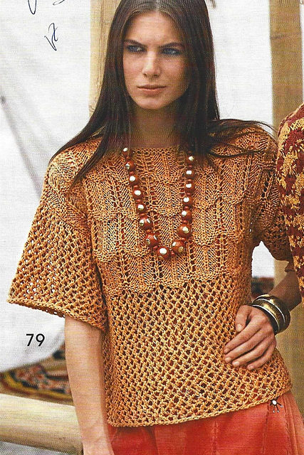 # 79 Pull mandarine ajouré