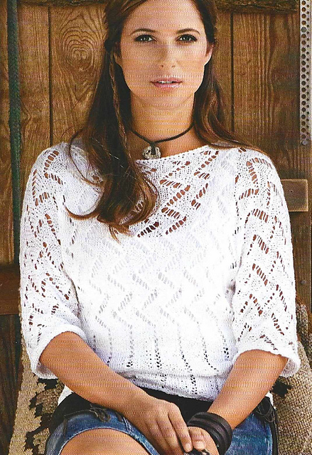 # 27 Pull blanc motif ajouré