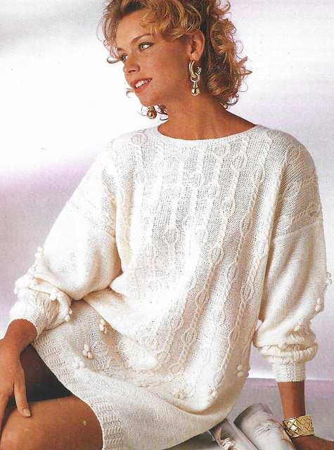 # 01 Pull blanc à nopes