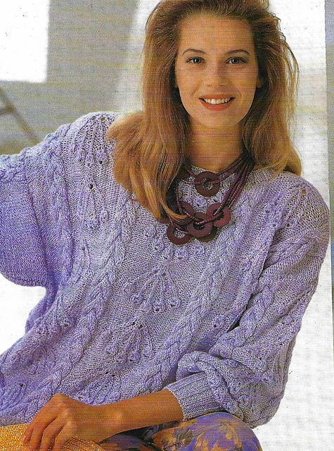 # 07 Pull lilas à motifs structurés
