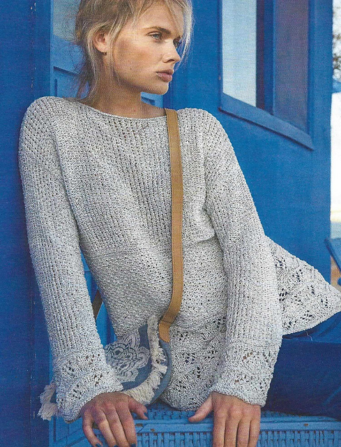 # 32 Pull gris argenté combinaison de motifs