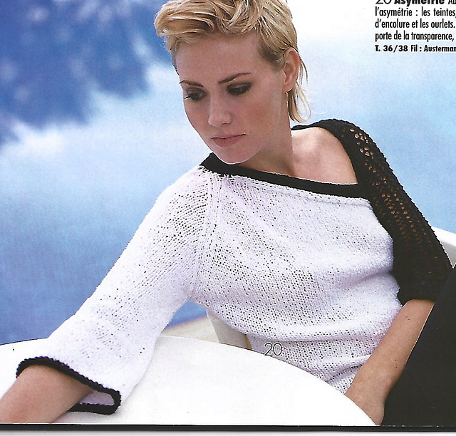 # 20 Pull raglan en blanc et noir