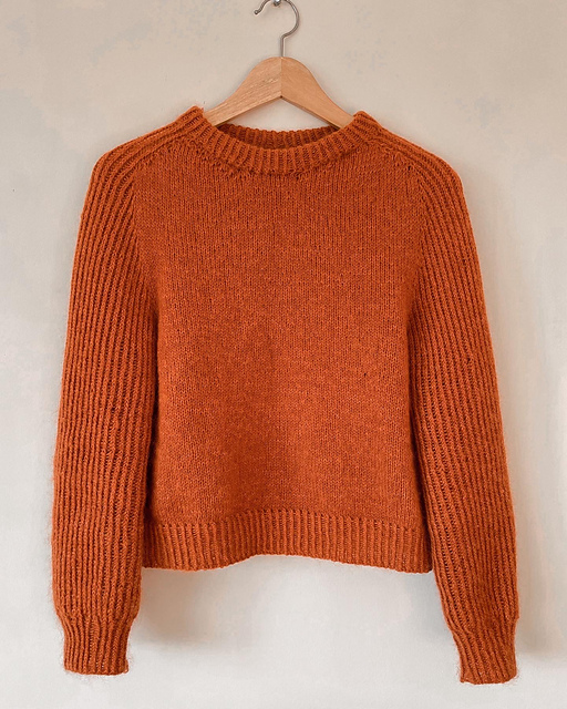 Ravelry: Kidsty Twist Sweater pattern by Rachael Everard