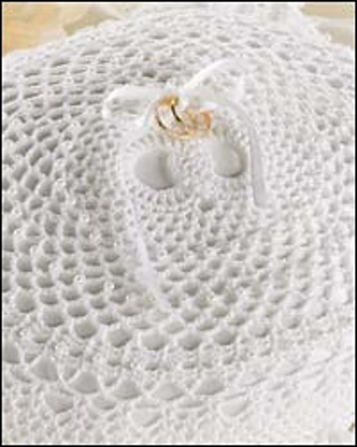 Ravelry Intertwined Ring Pillow pattern by Lori Zeller
