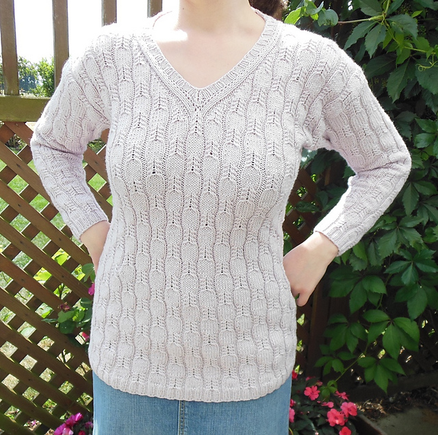 # 18 Rosafarbener Pullover