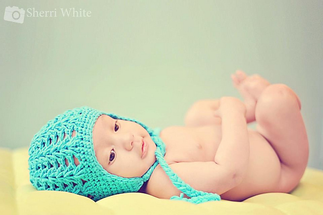 Open weave earflap hat