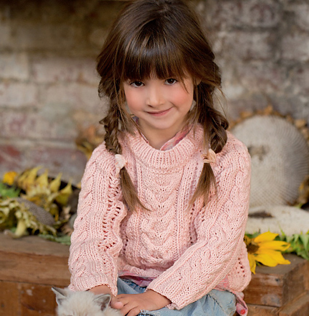 Little girl's cabled sweater