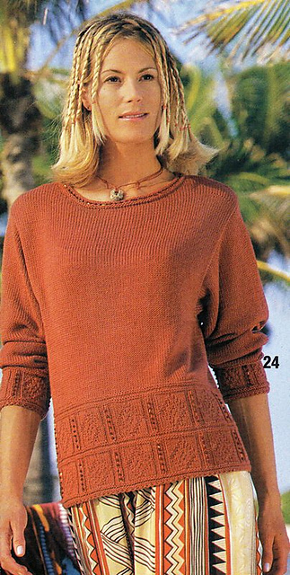 # 24 Rostbrauner Pulli mit Perlen