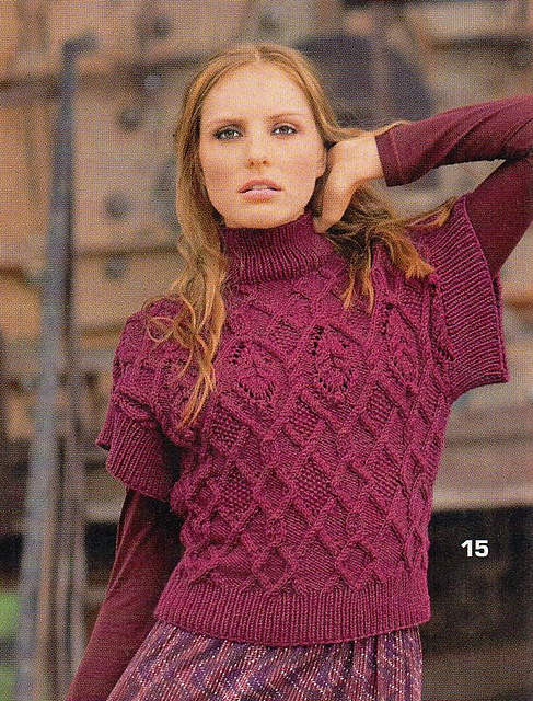 # 15 Pull à torsades en cyclamen