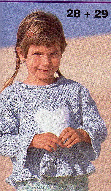# 28 Kinderpulli mit Herzmotiv