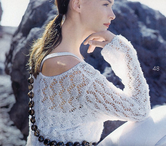 # 66 Weißer Pulli mit Spitzenajour