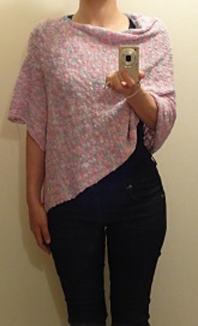 The loosely poncho with uneven hem
