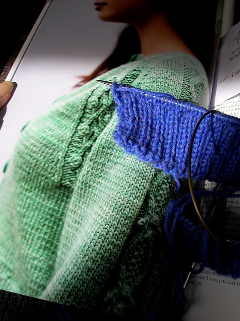 Cropped cardigan with cabled sleeves