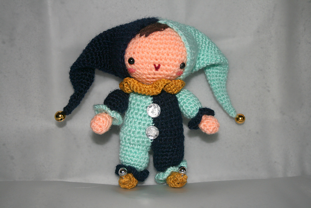 little harlequin/ jester