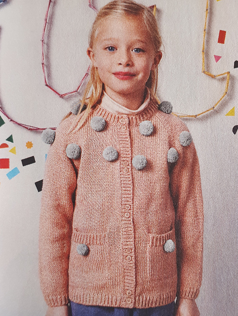 181 Cardigan à pompons