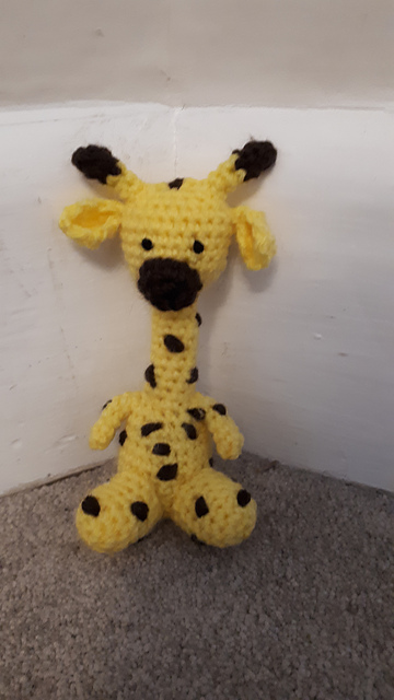 sitting giraffe toy