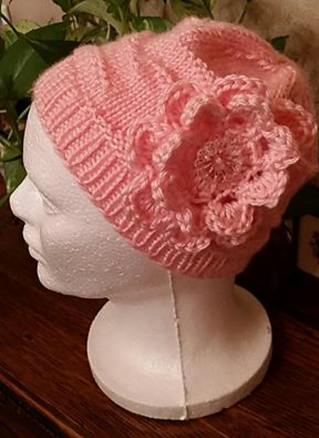Flower floating on waves hat