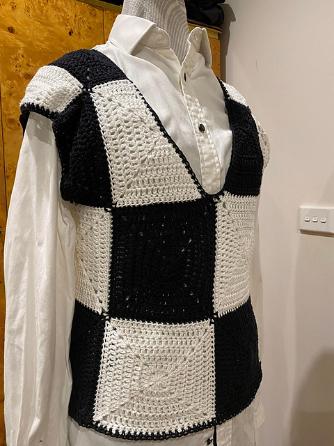 Wednesday Addams' loose black&white check vest