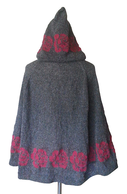 Poncho med roser og hætte