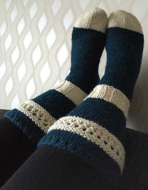 Knitted sock with decorative cuff