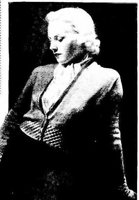 Knitted Cardigan with Smocked Basque and Cuffs