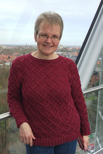 # 32 Flechtmusterpulli