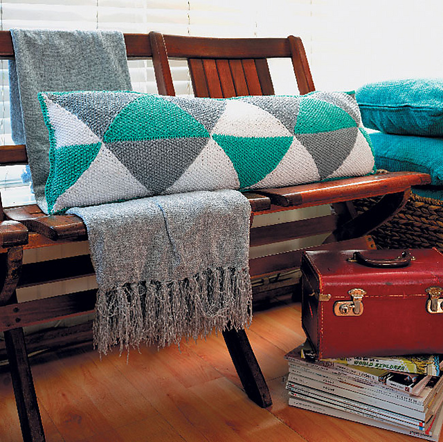 Knitted geometric bolster cushion
