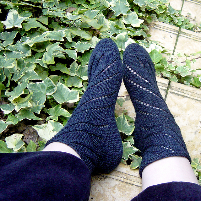 Ravelry: Blue Whirly Socks pattern by Henriette